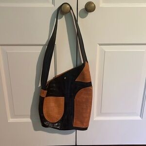 Sevilla Smith handmade black and tan shoulder bag. Product of zero waste project